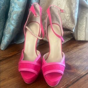 Beautiful pink platform heels. Never worn